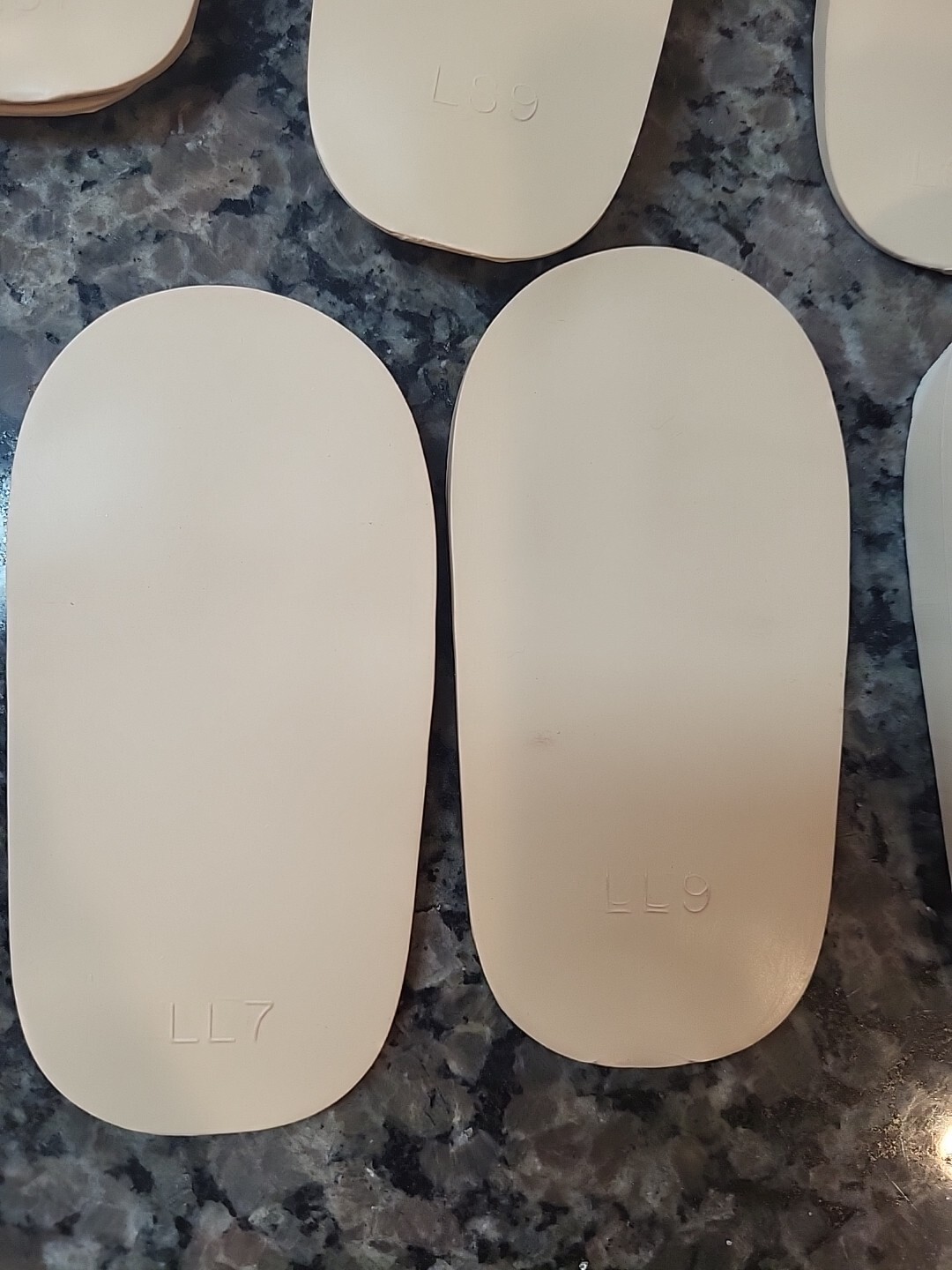Lot of 71 new Rubber Heel Lifts by G & W Heel lifts cream colored various sizes