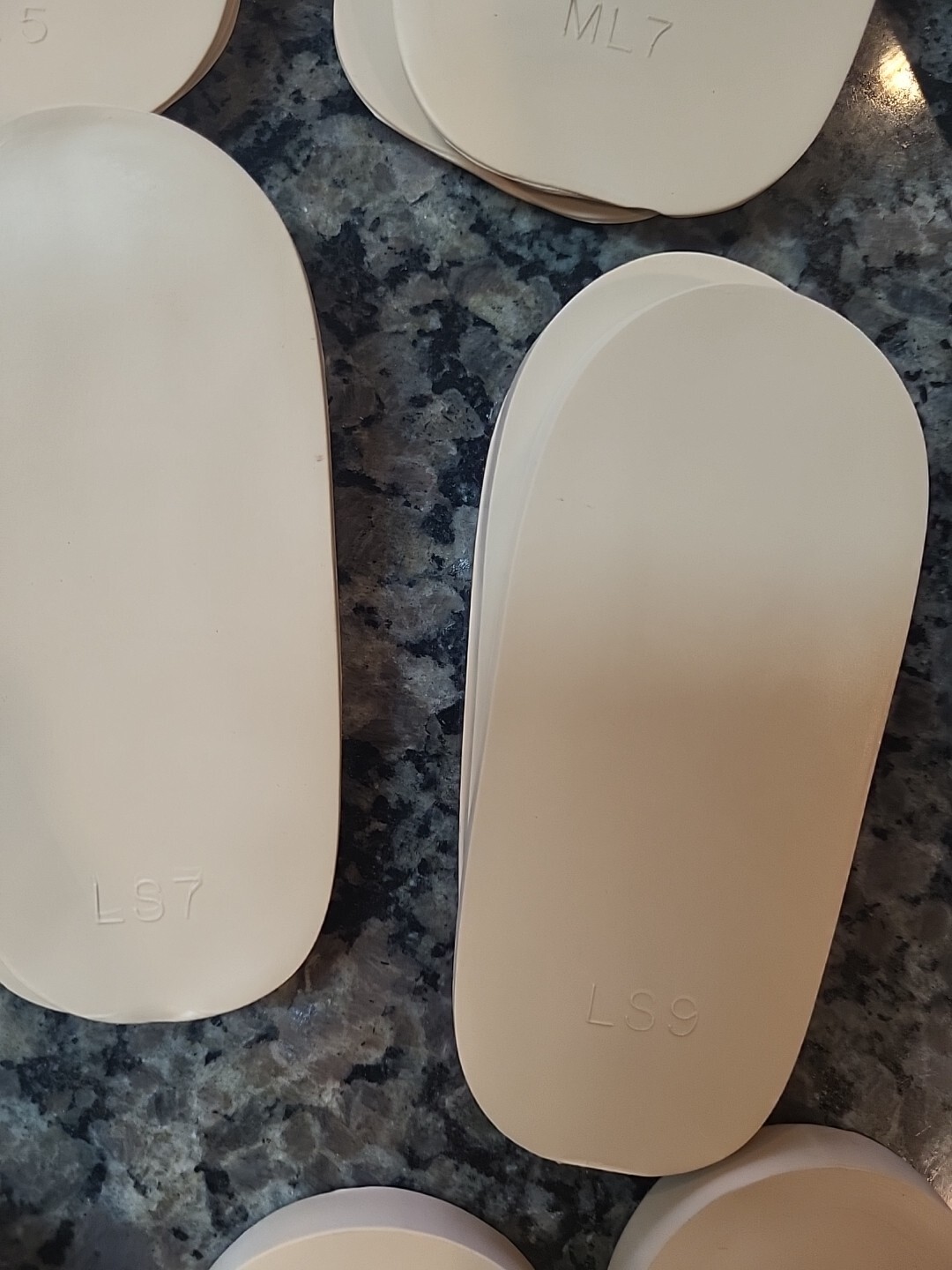 Lot of 71 new Rubber Heel Lifts by G & W Heel lifts cream colored various sizes