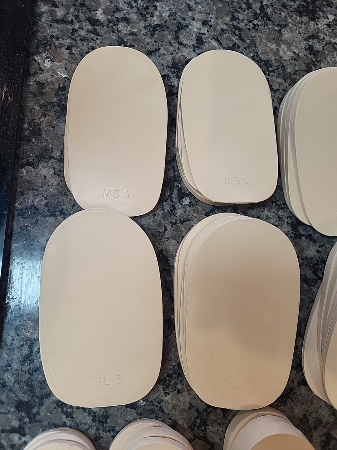 Lot of 71 new Rubber Heel Lifts by G & W Heel lifts cream colored various sizes