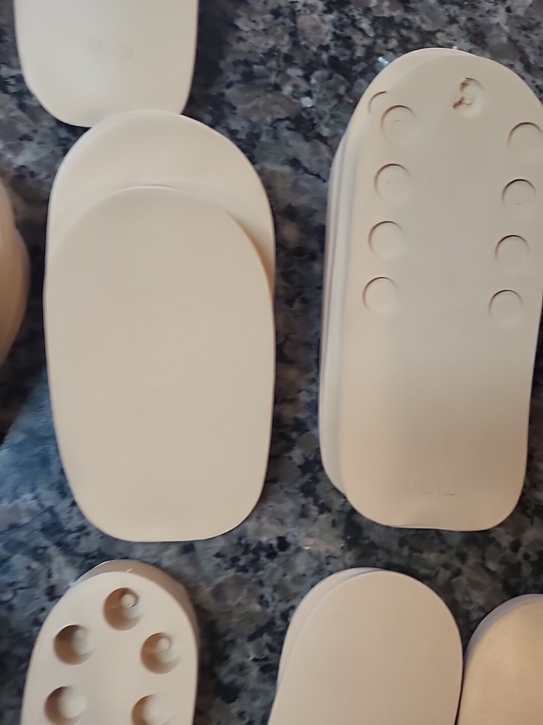 Lot of 71 new Rubber Heel Lifts by G & W Heel lifts cream colored various sizes