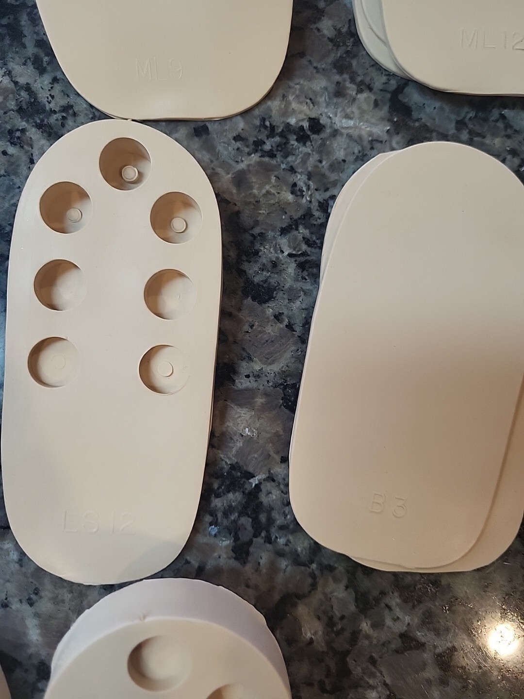 Lot of 71 new Rubber Heel Lifts by G & W Heel lifts cream colored various sizes