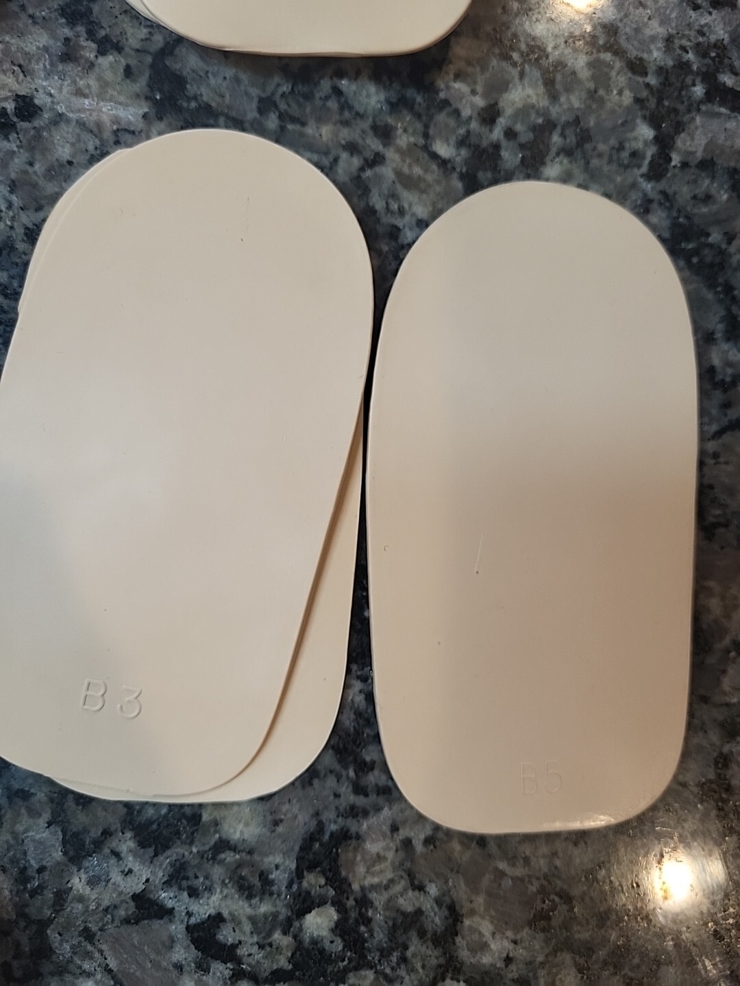 Lot of 71 new Rubber Heel Lifts by G & W Heel lifts cream colored various sizes